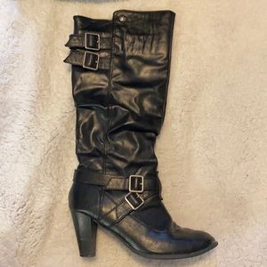 Heeled calf height boots